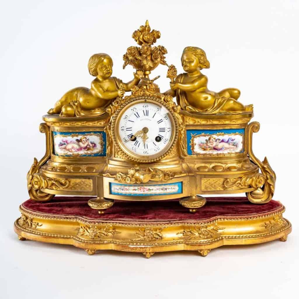 Pendule en bronze et plaque de Sèvres, XIXème siècle | Biron |||||||||||