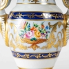 Paire de vases directoires Le Tallec, à motifs Baron Jourdan | Biron Paire de vases directoires Le Tallec, à motifs Baron Jourdan