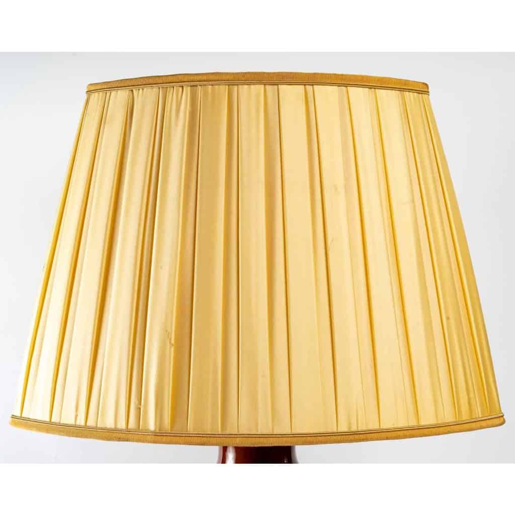 Lampe en porcelaine de couleur sang de boeuf, XXème siècle | Biron Lampe en porcelaine de couleur sang de boeuf, XXème siècle
