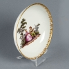Tasse et soucoupe, au décor peint d’après Watteau, Meissen, Circa 1745. | Biron Tasse et soucoupe, au décor peint d'après Watteau, Meissen, Circa 1745.