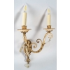 3 appliques à 2 lumières en fer forgé, début XXème siècle | Biron 3 appliques à 2 lumières en fer forgé, début XXème siècle