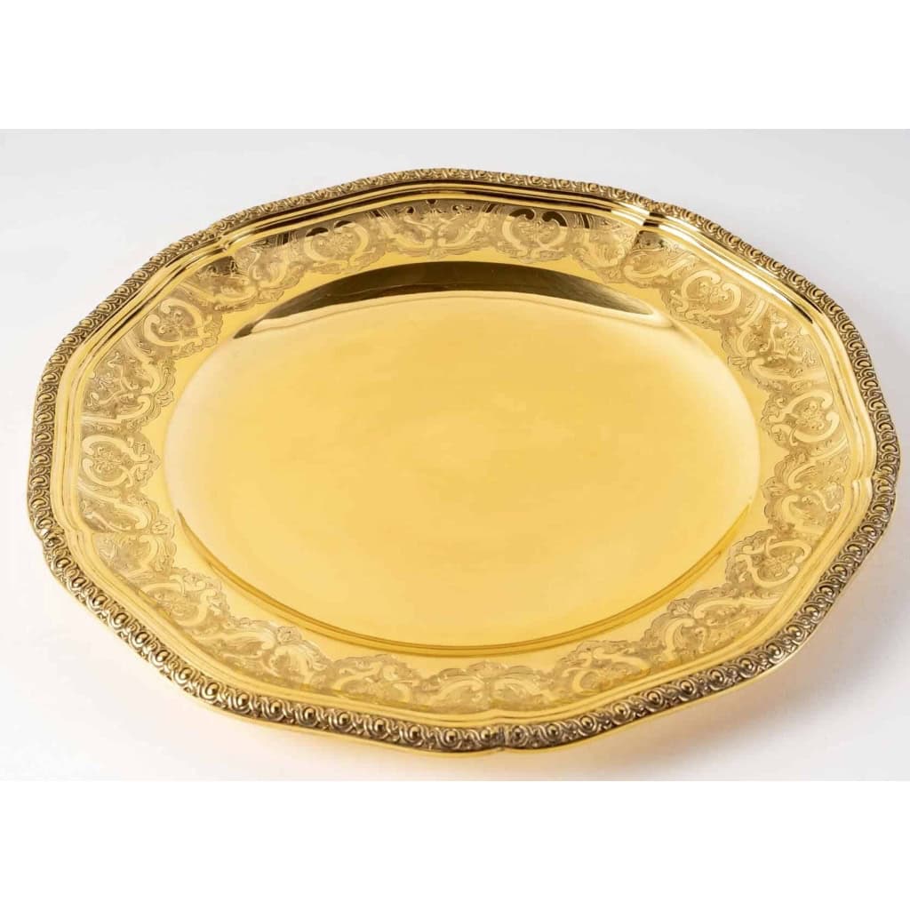 Suite de 7 plats de service "Elysée" en vermeil (argent massif plaqué or) de PUIFORCAT