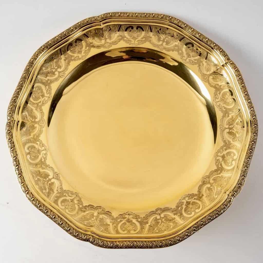 Suite de 7 plats de service "Elysée" en vermeil (argent massif plaqué or) de PUIFORCAT