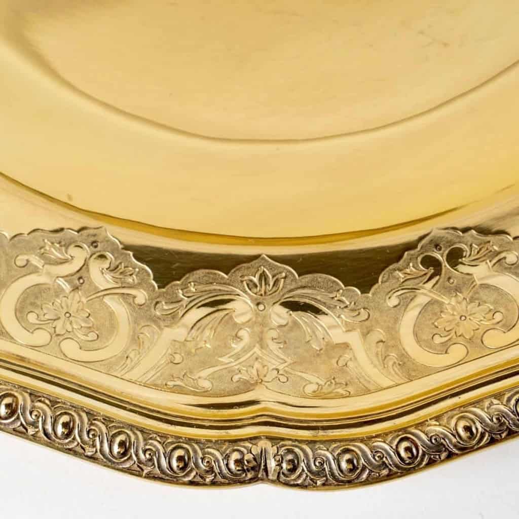 Suite de 7 plats de service "Elysée" en vermeil (argent massif plaqué or) de PUIFORCAT