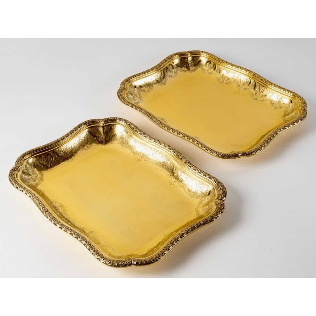 Suite de 7 plats de service "Elysée" en vermeil (argent massif plaqué or) de PUIFORCAT