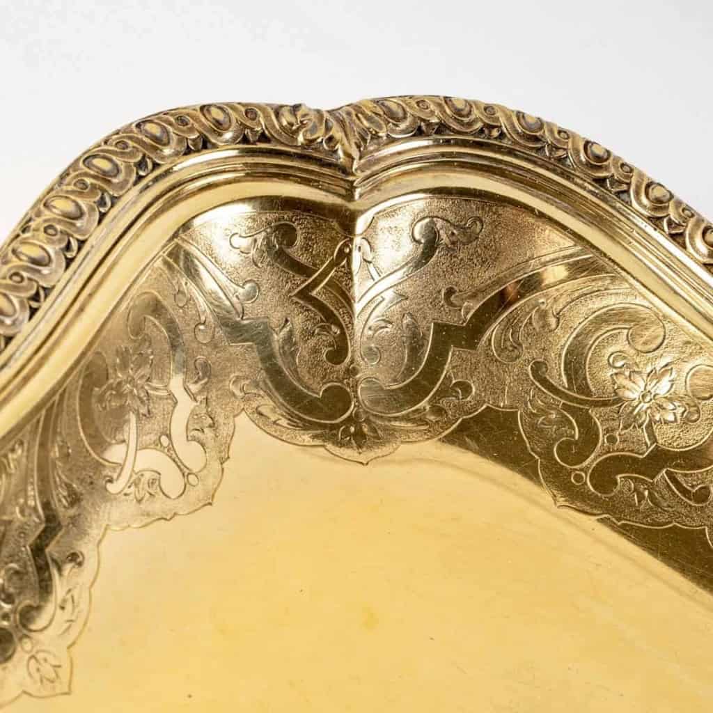 Suite de 7 plats de service "Elysée" en vermeil (argent massif plaqué or) de PUIFORCAT