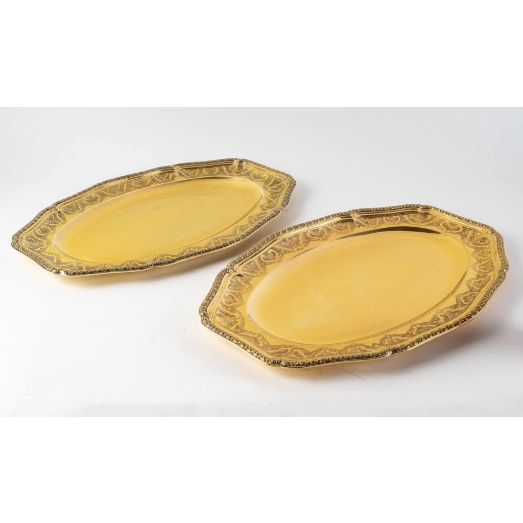 Suite de 7 plats de service "Elysée" en vermeil (argent massif plaqué or) de PUIFORCAT