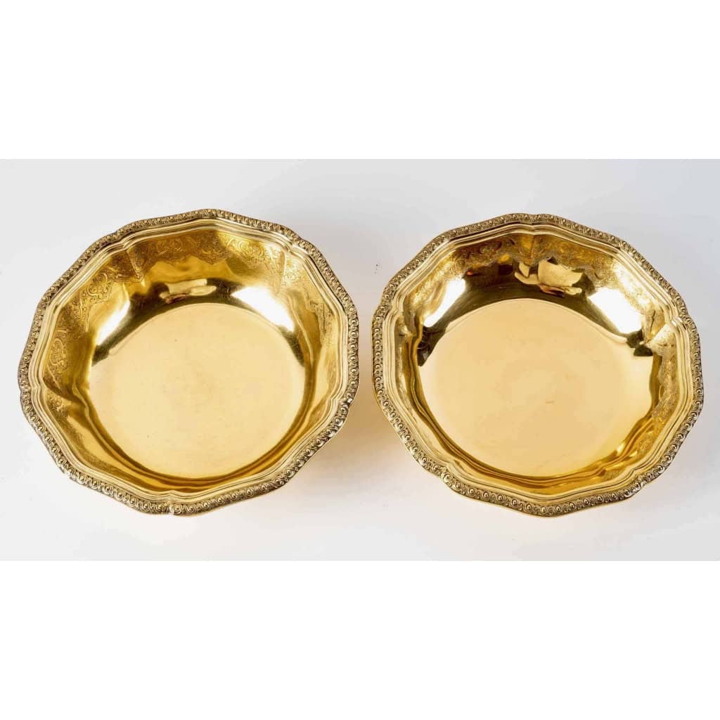 Suite de 7 plats de service "Elysée" en vermeil (argent massif plaqué or) de PUIFORCAT