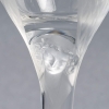 Suite de 12 Flûtes à Champagne « Ange de Reims » cristal blanc de LALIQUE FRANCE | Biron Suite de 12 Flûtes à Champagne "Ange de Reims" cristal blanc de LALIQUE FRANCE