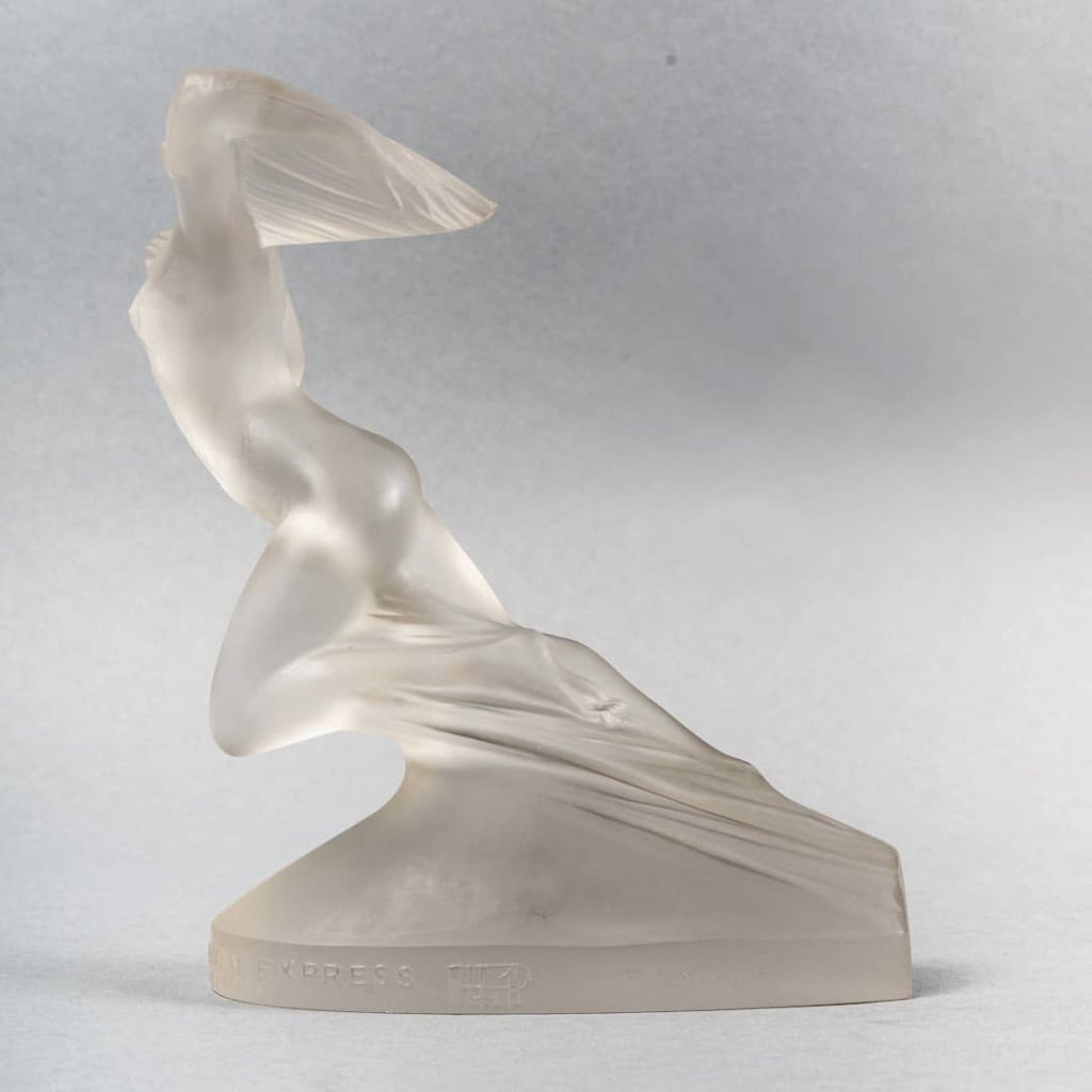Statuette Commémorative « Côte d’Azur Pullman Express » verre blanc de René LALIQUE | Biron Statuette Commémorative "Côte d'Azur Pullman Express" verre blanc de René LALIQUE