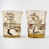 Deux verres à saké – liqueur « Chardons » verre jaune à décor de chardons émaillés d’Emile GALLE | Biron Deux verres à saké - liqueur "Chardons" verre jaune à décor de chardons émaillés d'Emile GALLE