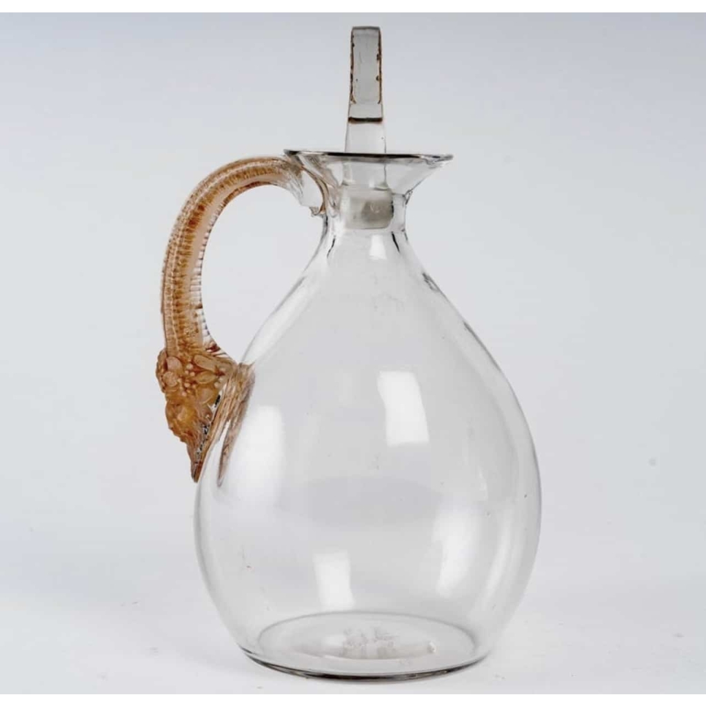 Carafe "Satyre" verre blanc patiné sépia de René LALIQUE pour Cusenier Carafe "Satyre" verre blanc patiné sépia de René LALIQUE pour Cusenier