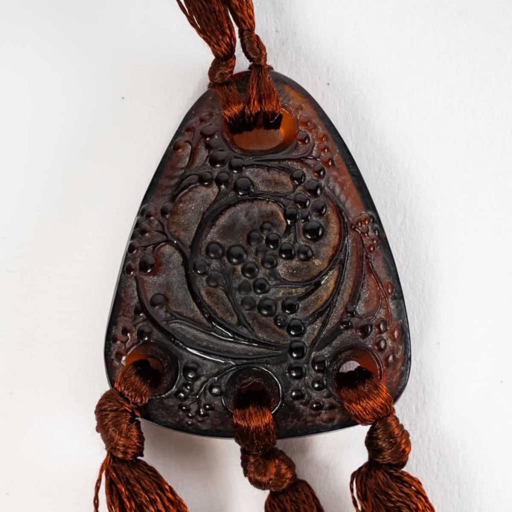 Pendentif « Graines » verre ambre foncé de René LALIQUE | Biron ||||