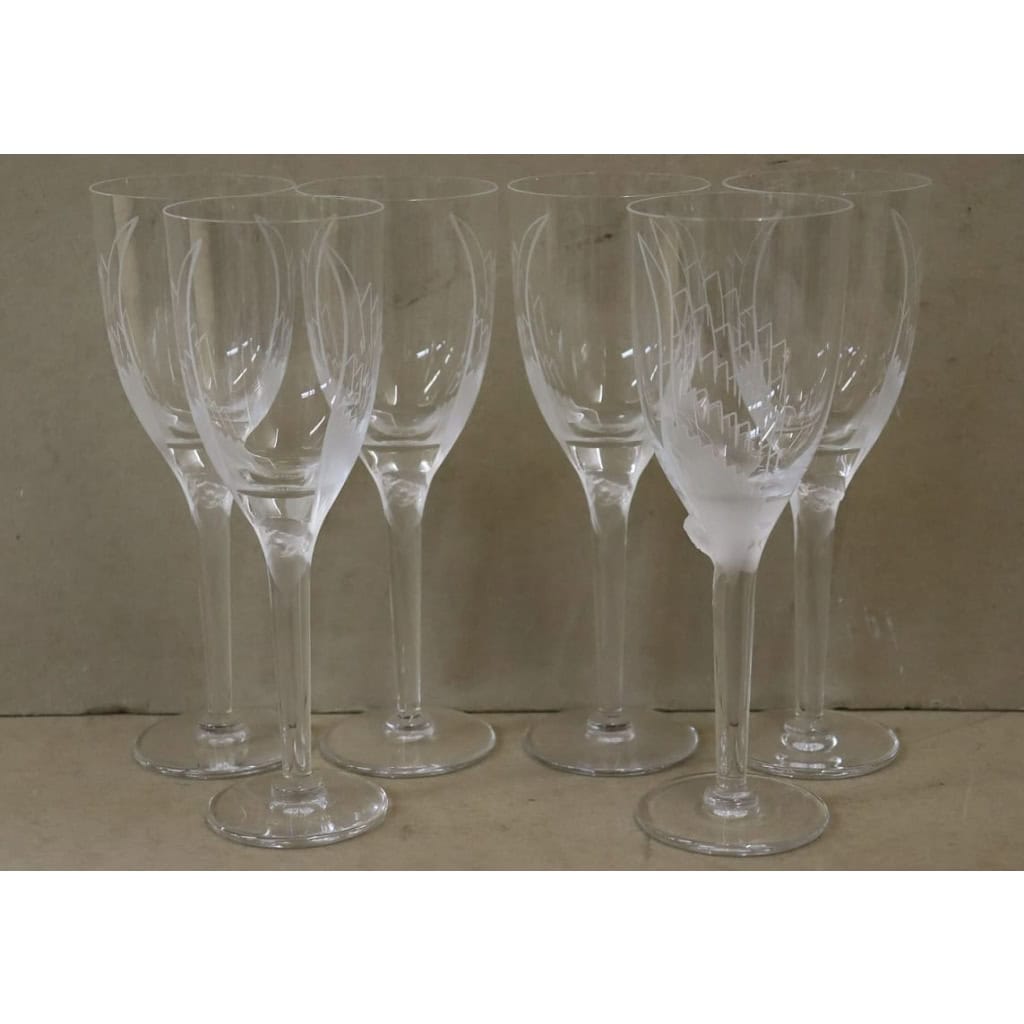 Marc Lalique : Douze flûtes à champagne « Ange » en Cristal | Biron Marc Lalique : Douze flûtes à champagne "Ange" en Cristal