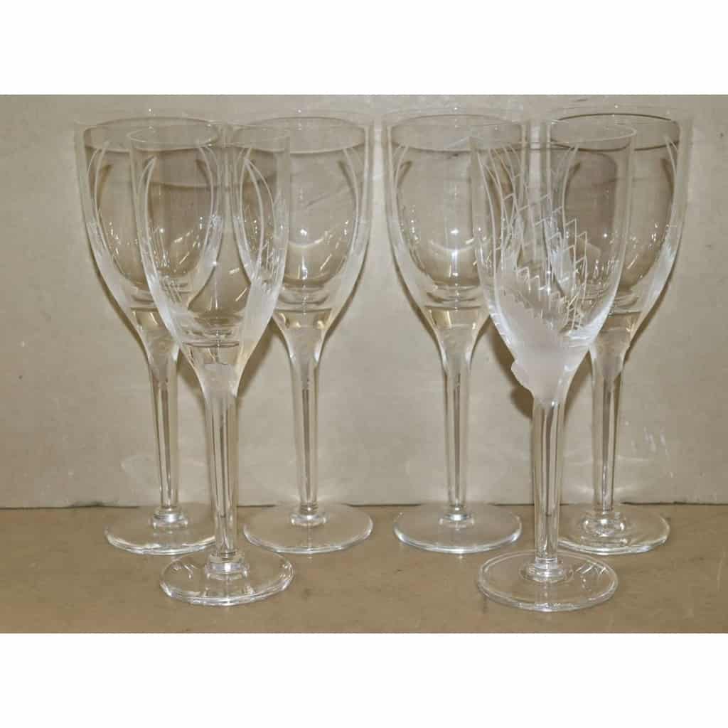 Marc Lalique : Douze flûtes à champagne « Ange » en Cristal | Biron Marc Lalique : Douze flûtes à champagne "Ange" en Cristal