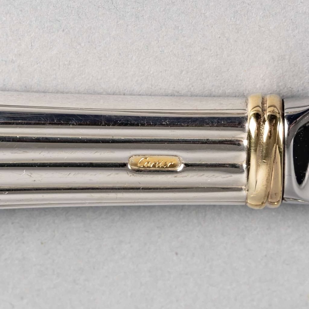 Ménagère « Trinity » métal argenté de CARTIER – 79 pièces | Biron Ménagère "Trinity" métal argenté de CARTIER - 79 pièces