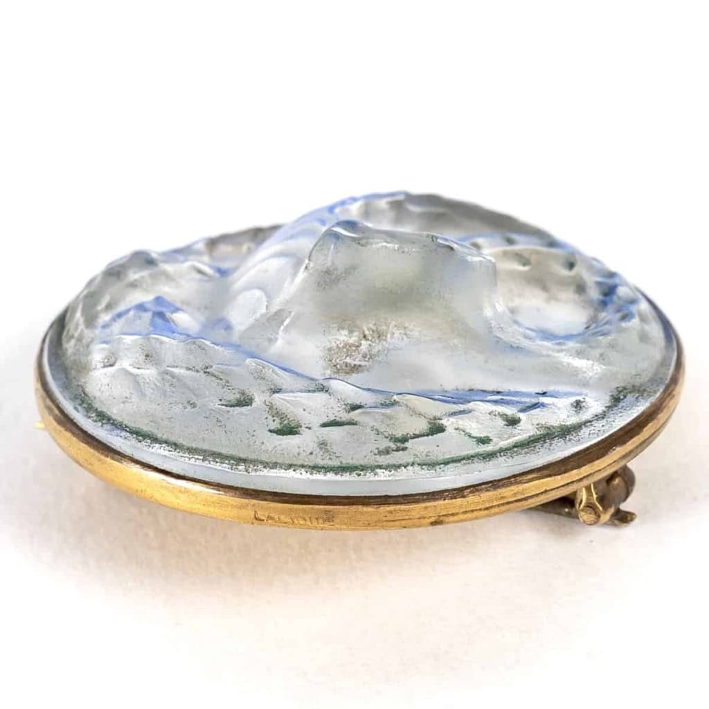 Broche « Serpent » verre blanc sur clinquant bleu électrique de René LALIQUE | Biron Broche "Serpent" verre blanc sur clinquant bleu électrique de René LALIQUE