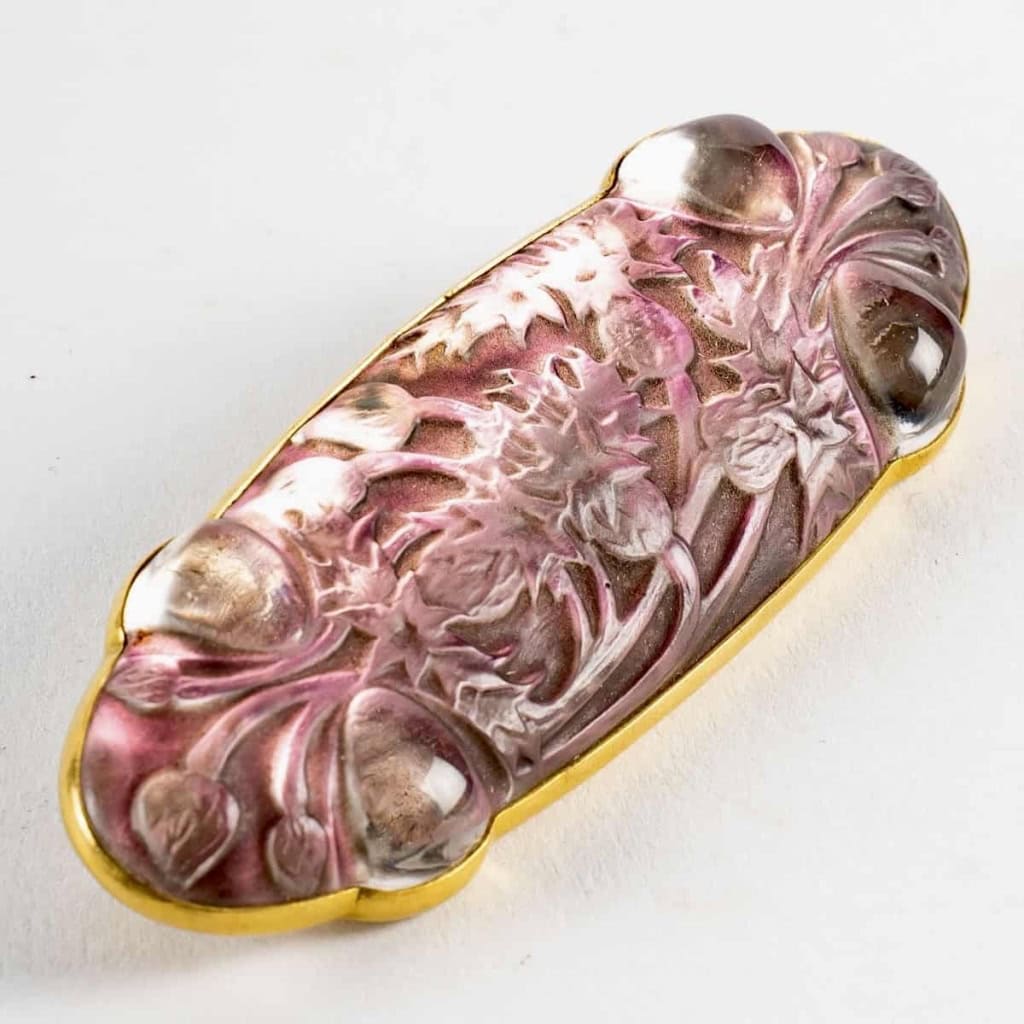 Broche Quatre Cabochons Bluets Verre Blanc Patiné Gris Sur Clinquant Rose de René LALIQUE | Biron Broche Quatre Cabochons Bluets Verre Blanc Patiné Gris Sur Clinquant Rose de René LALIQUE
