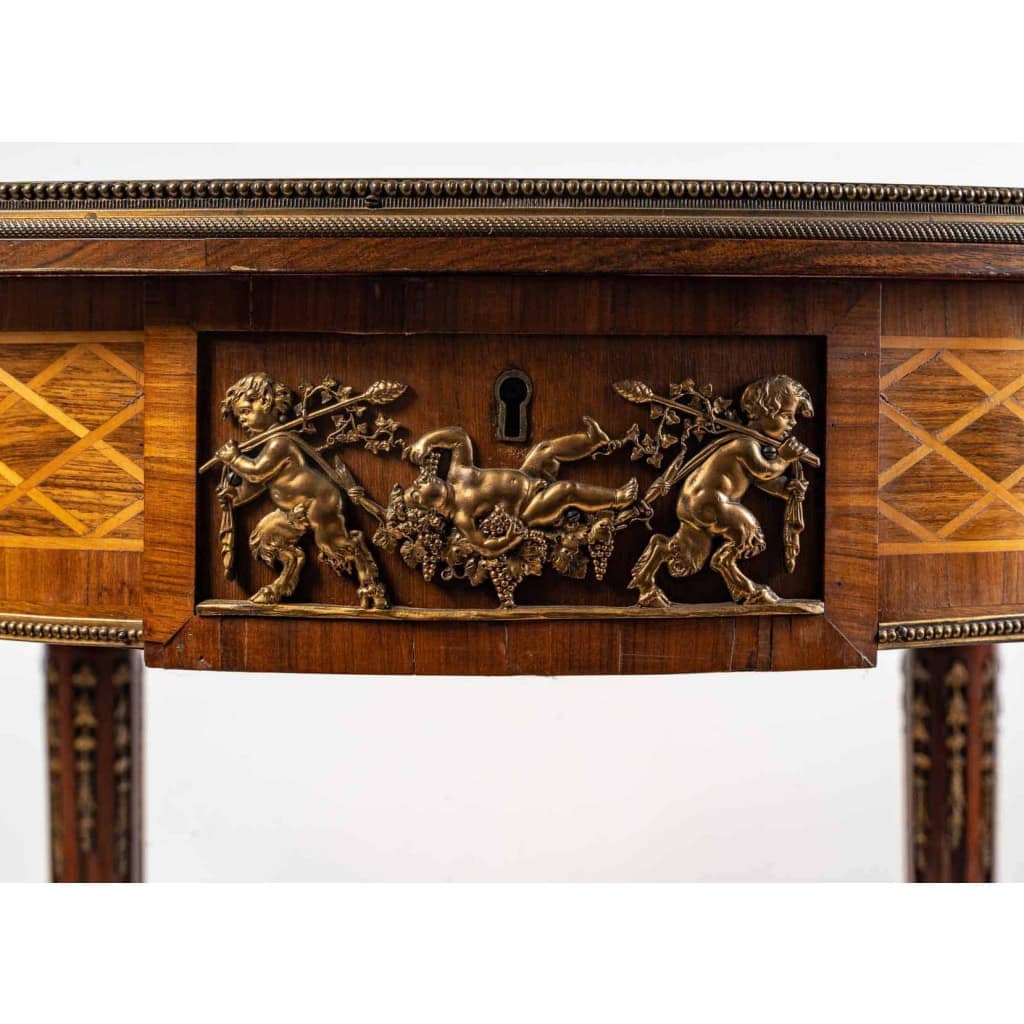 Guéridon en bois et bronze ciselé et doré XIXème siècle