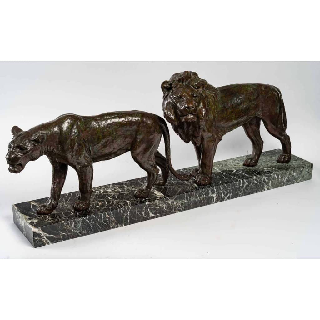 Bronze lion et lionne, marbre vert, début XXème siècle | Biron Bronze lion et lionne, marbre vert, début XXème siècle