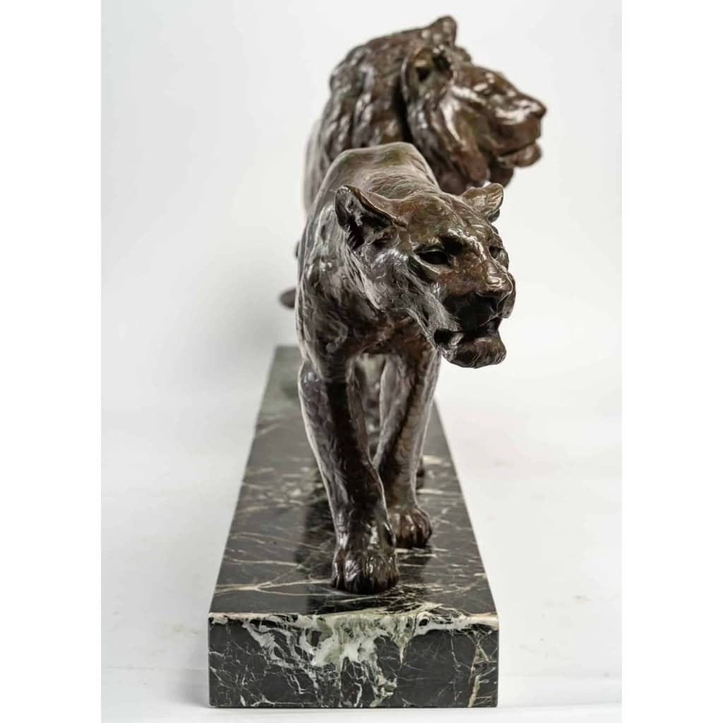 Bronze lion et lionne, marbre vert, début XXème siècle | Biron Bronze lion et lionne, marbre vert, début XXème siècle