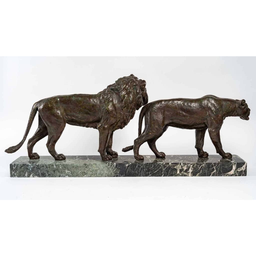Bronze lion et lionne, marbre vert, début XXème siècle | Biron Bronze lion et lionne, marbre vert, début XXème siècle