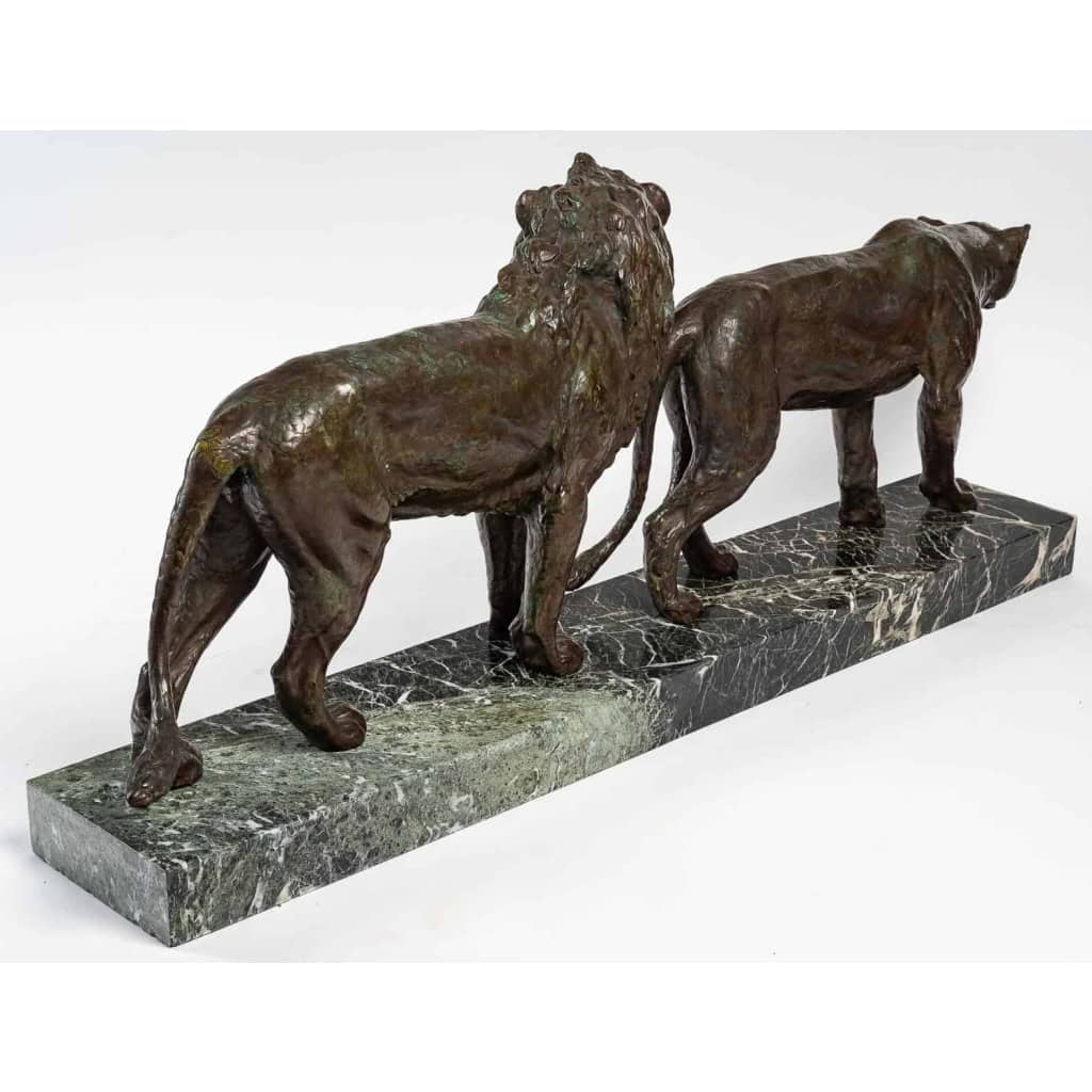 Bronze lion et lionne, marbre vert, début XXème siècle | Biron Bronze lion et lionne, marbre vert, début XXème siècle