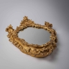 Miroir italien en bois sculpté et doré d'époque Régence