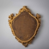 Miroir italien en bois sculpté et doré d'époque Régence