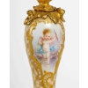 Paire de vases miniatures en porcelaine et bronze doré XIXème siècle