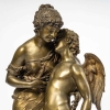 Bronze « Cupidon et une jeune femme », couleur médaille, XIXème siècle | Biron Bronze "Cupidon et une jeune femme", couleur médaille, XIXème siècle