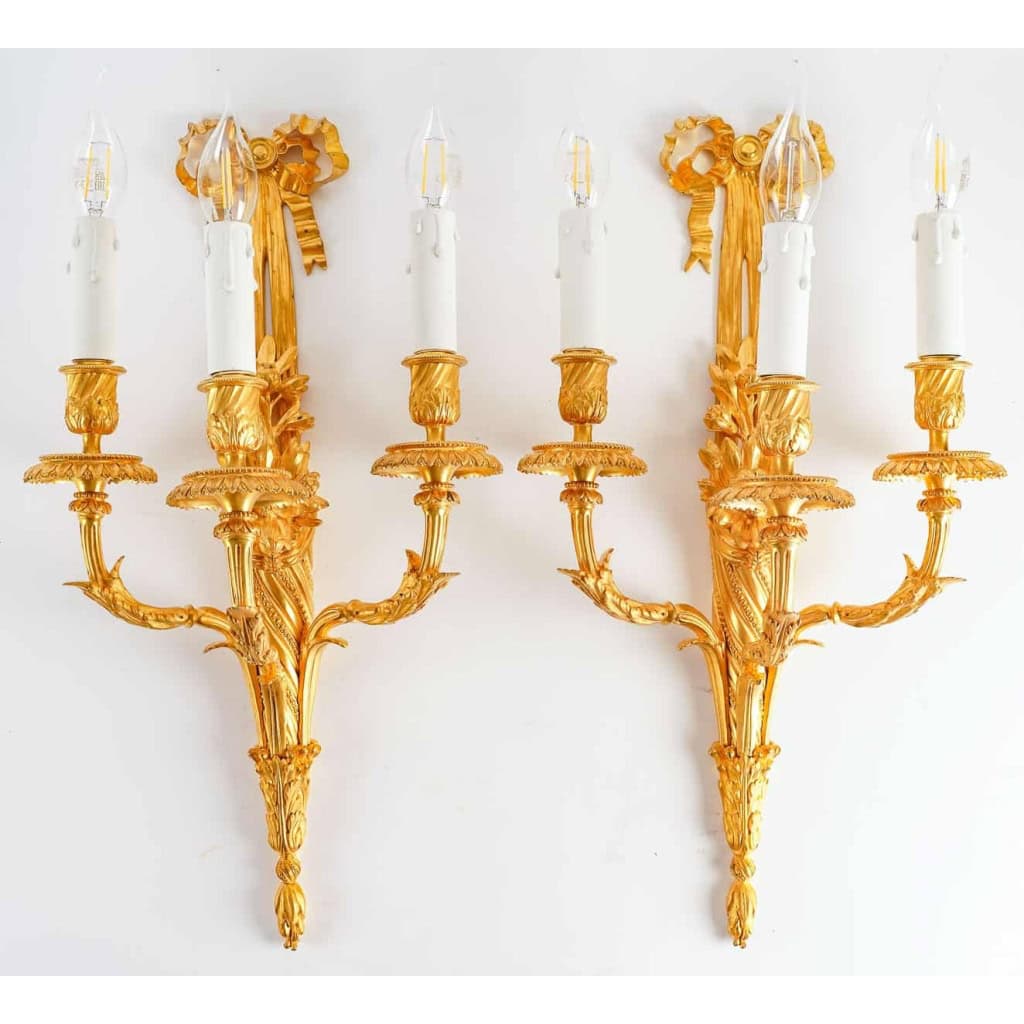 Paire d’appliques de style Louis XVI signées Jollet. | Biron ||||