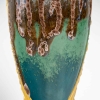 Vase en grès flammé à décor de coulures, sur socle en bronze à patine dorée, signé Paul Louchet, début XXe siècle. | Biron Vase en grès flammé à décor de coulures, sur socle en bronze à patine dorée, signé Paul Louchet, début XXe siècle.