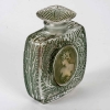 Flacon « Fougères » verre blanc patiné vert de René LALIQUE | Biron Flacon "Fougères" verre blanc patiné vert de René LALIQUE
