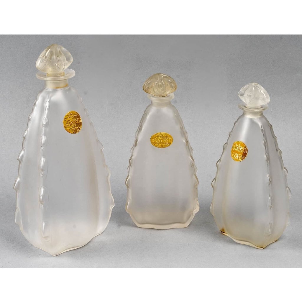 Trois Flacons « L’Origan » verre blanc de René LALIQUE pour Coty | Biron Trois Flacons "L'Origan" verre blanc de René LALIQUE pour Coty