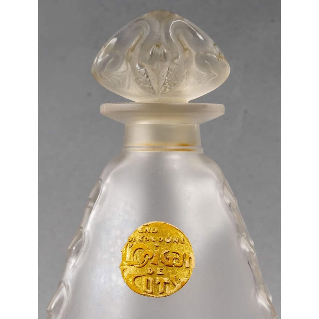 Trois Flacons « L’Origan » verre blanc de René LALIQUE pour Coty | Biron Trois Flacons "L'Origan" verre blanc de René LALIQUE pour Coty