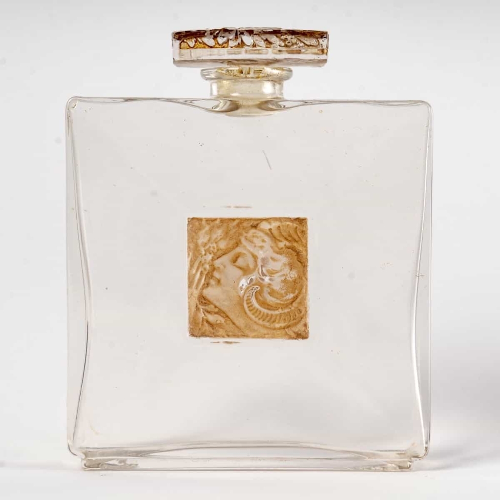 Flacon « L’Origan » verre blanc patiné sépia de René LALIQUE pour D’Héraud | Biron |||||||||