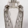 Flacon « Cigalia » verre blanc patiné gris de René LALIQUE pour Roger et Gallet | Biron Flacon "Cigalia" verre blanc patiné gris de René LALIQUE pour Roger et Gallet