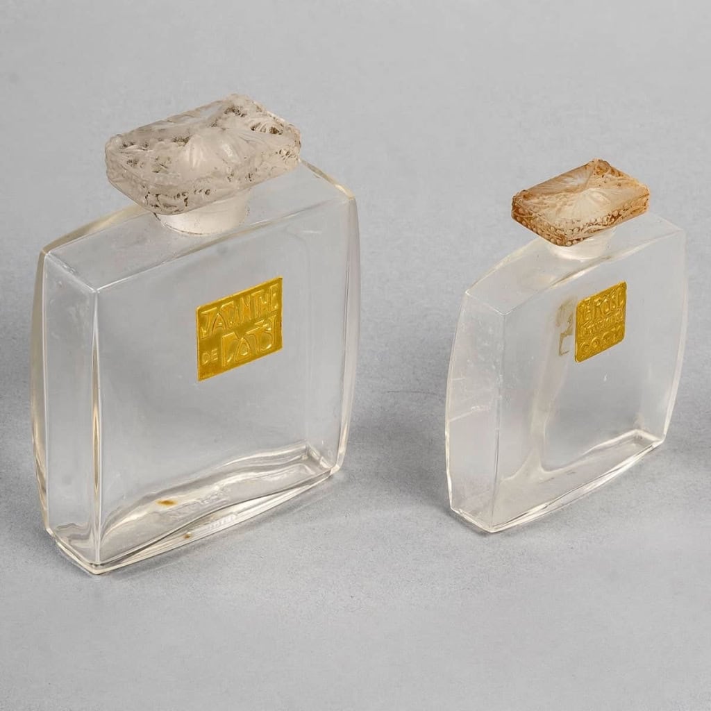 Deux Flacons « Muguet » verre blanc de René LALIQUE pour Coty | Biron Deux Flacons "Muguet" verre blanc de René LALIQUE pour Coty