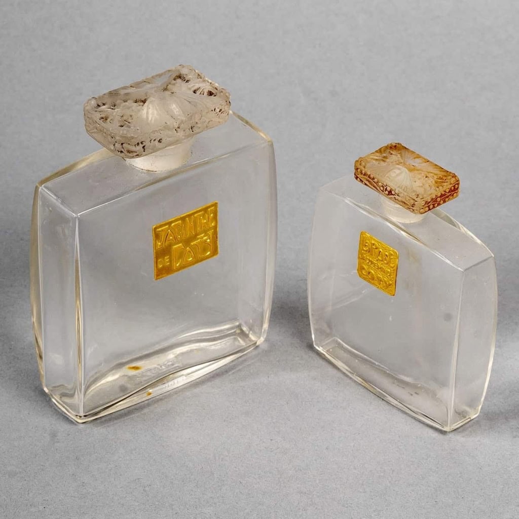 Deux Flacons « Muguet » verre blanc de René LALIQUE pour Coty | Biron Deux Flacons "Muguet" verre blanc de René LALIQUE pour Coty