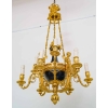 Lustre en bronze doré et métal patiné dit « aux Termes » fin XIXème Siècle | Biron Lustre en bronze doré et métal patiné dit "aux Termes" fin XIXème Siècle