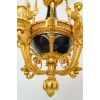 Lustre en bronze doré et métal patiné dit « aux Termes » fin XIXème Siècle | Biron Lustre en bronze doré et métal patiné dit "aux Termes" fin XIXème Siècle