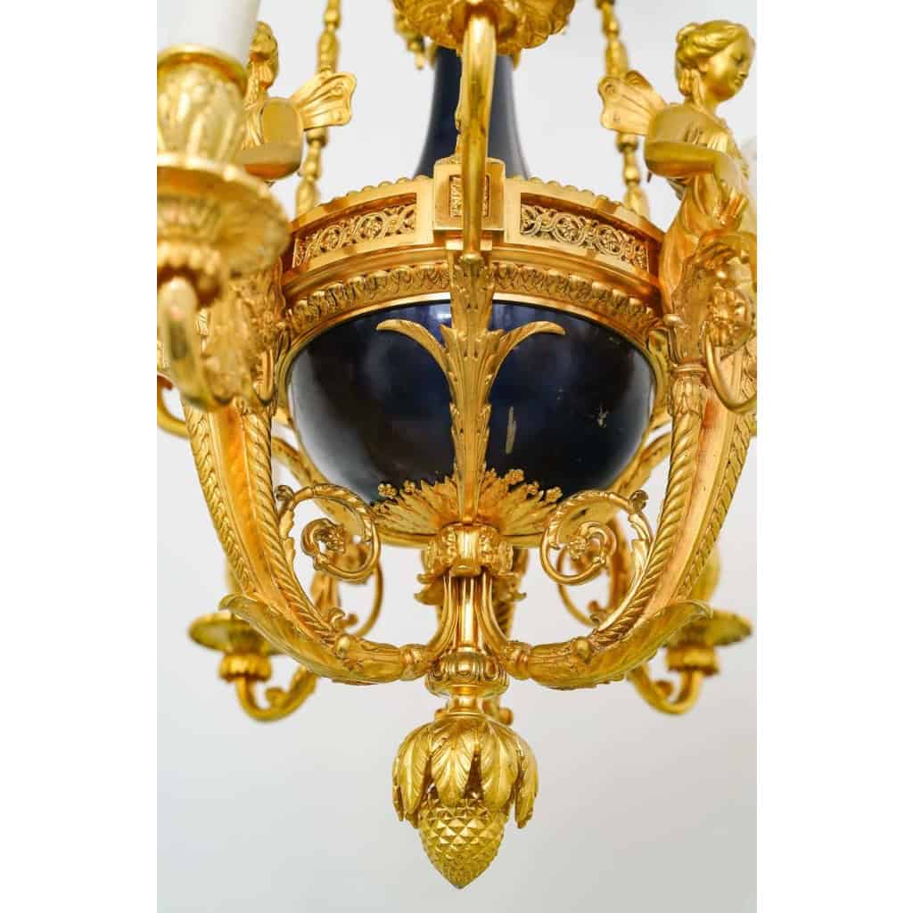 Lustre en bronze doré et métal patiné dit « aux Termes » fin XIXème Siècle | Biron Lustre en bronze doré et métal patiné dit "aux Termes" fin XIXème Siècle