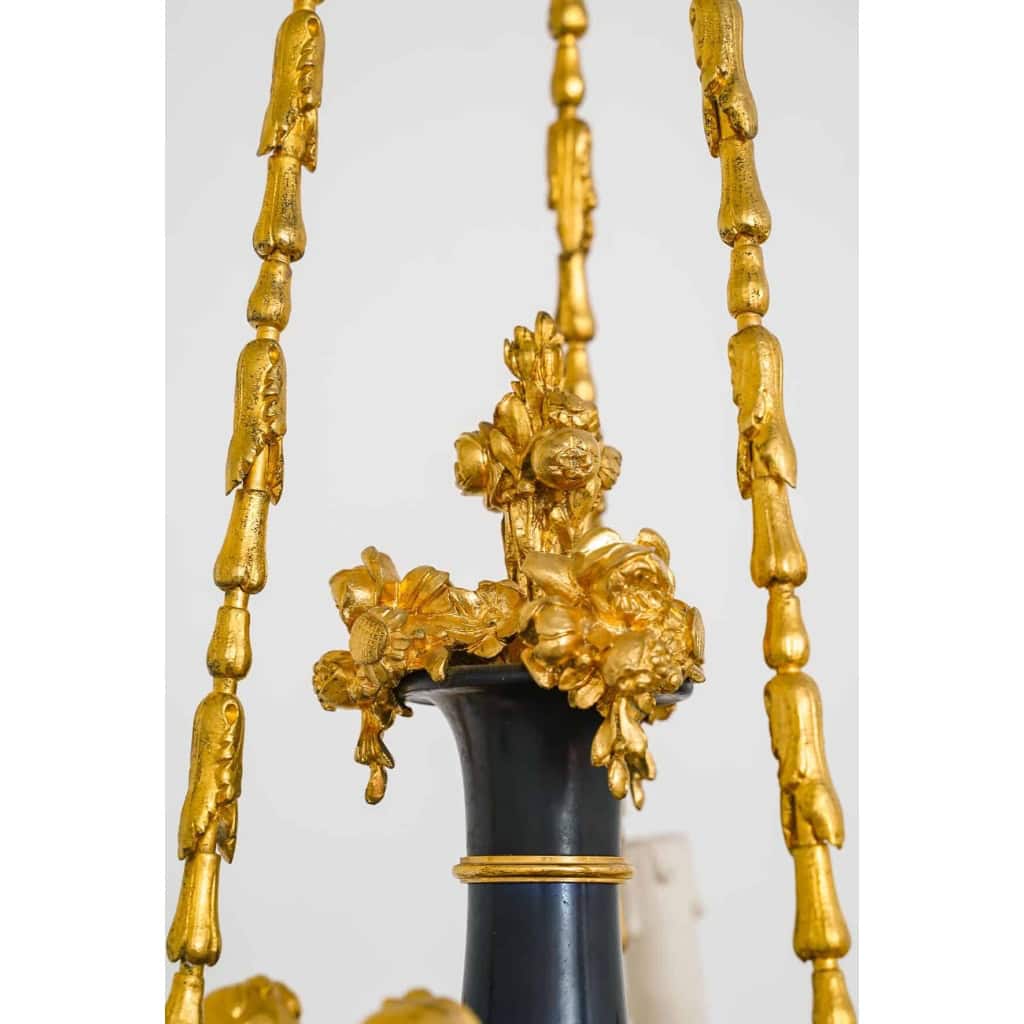 Lustre en bronze doré et métal patiné dit « aux Termes » fin XIXème Siècle | Biron Lustre en bronze doré et métal patiné dit "aux Termes" fin XIXème Siècle