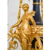 Lustre en bronze doré et métal patiné dit « aux Termes » fin XIXème Siècle | Biron Lustre en bronze doré et métal patiné dit "aux Termes" fin XIXème Siècle