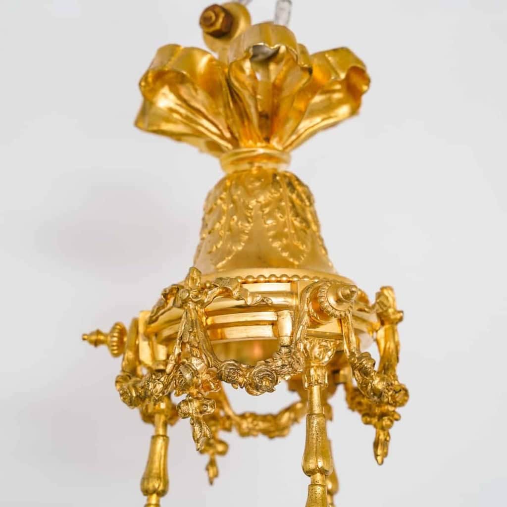 Lustre en bronze doré et métal patiné dit « aux Termes » fin XIXème Siècle | Biron Lustre en bronze doré et métal patiné dit "aux Termes" fin XIXème Siècle