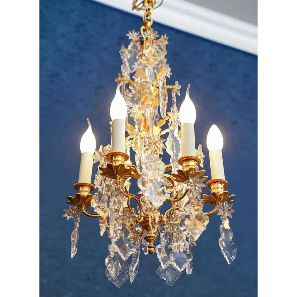 Paire de lustres de style Louis XV. | Biron Paire de lustres de style Louis XV.