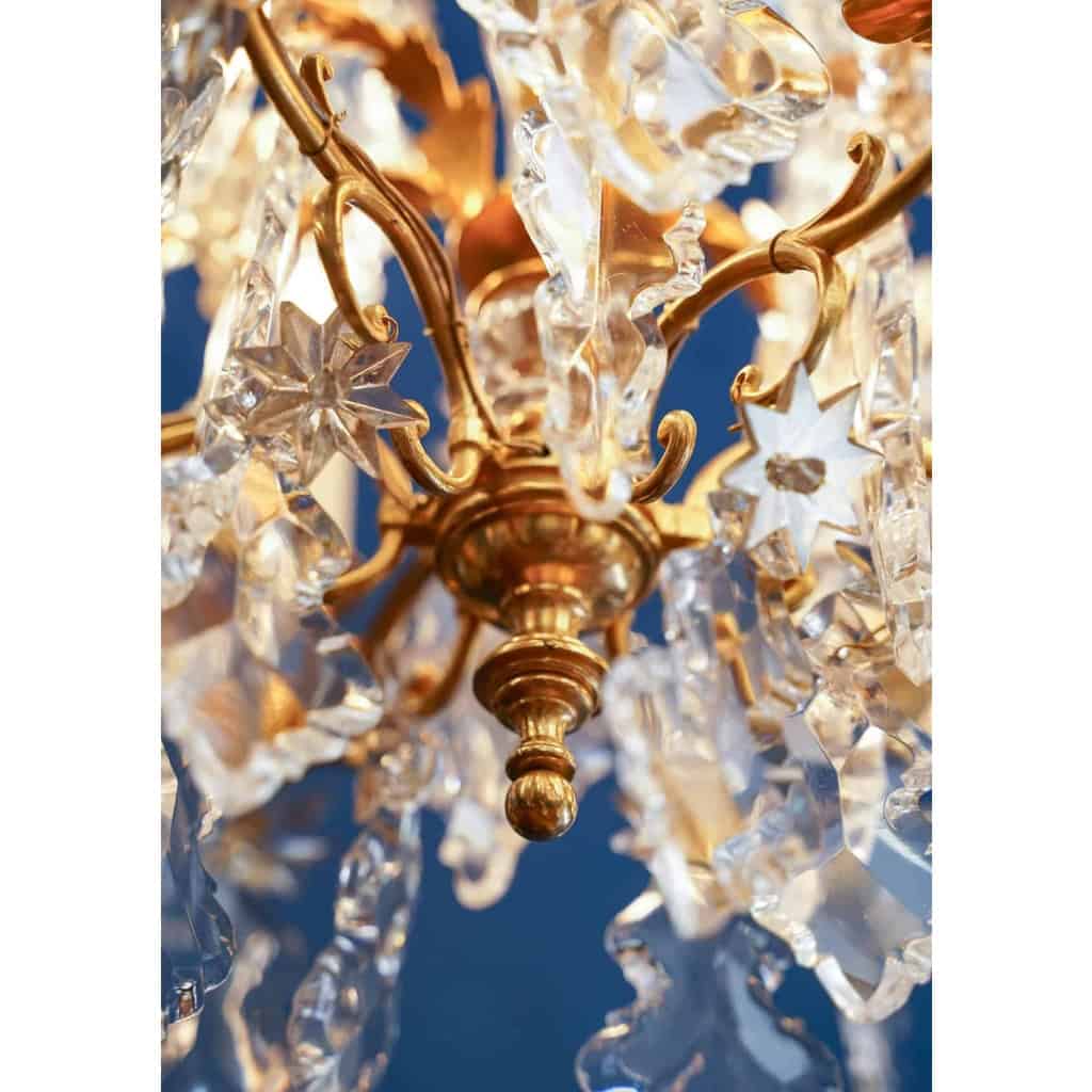 Paire de lustres de style Louis XV. | Biron Paire de lustres de style Louis XV.
