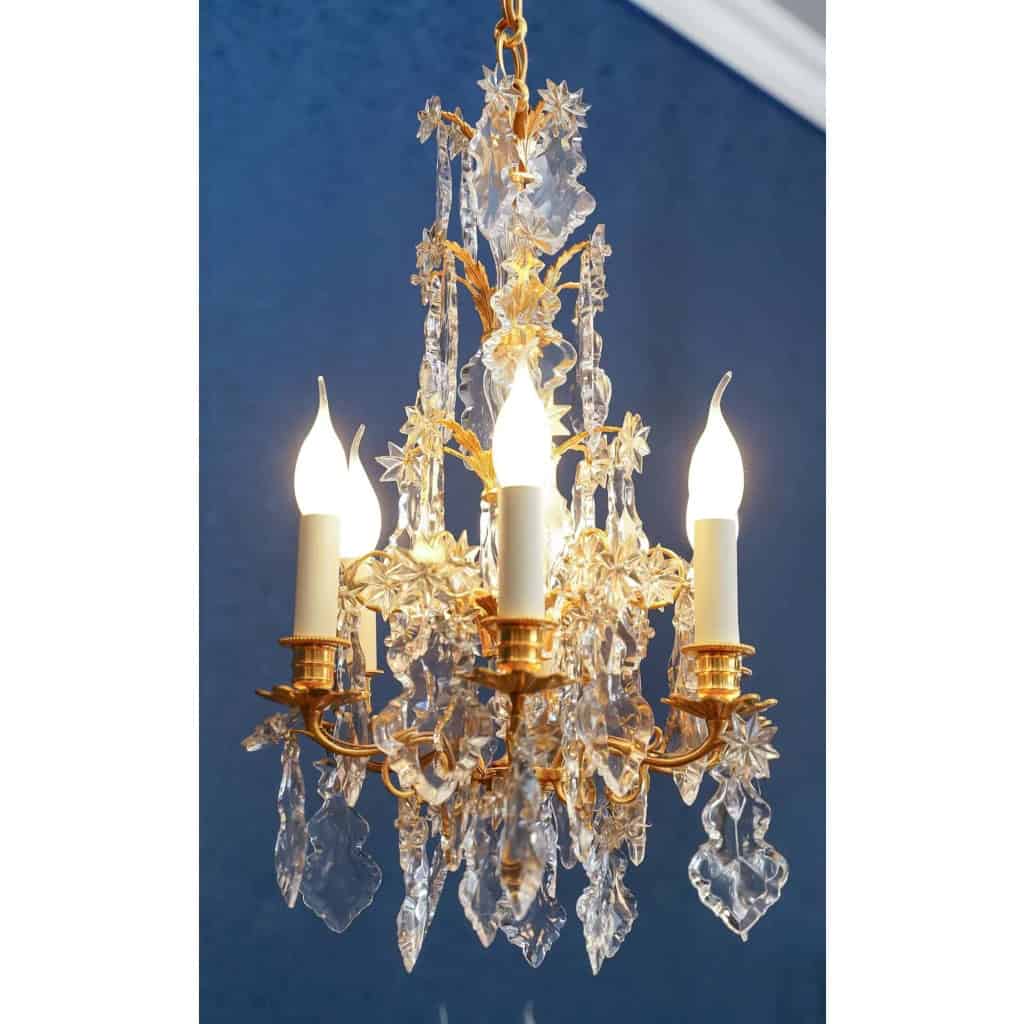 Paire de lustres de style Louis XV. | Biron Paire de lustres de style Louis XV.