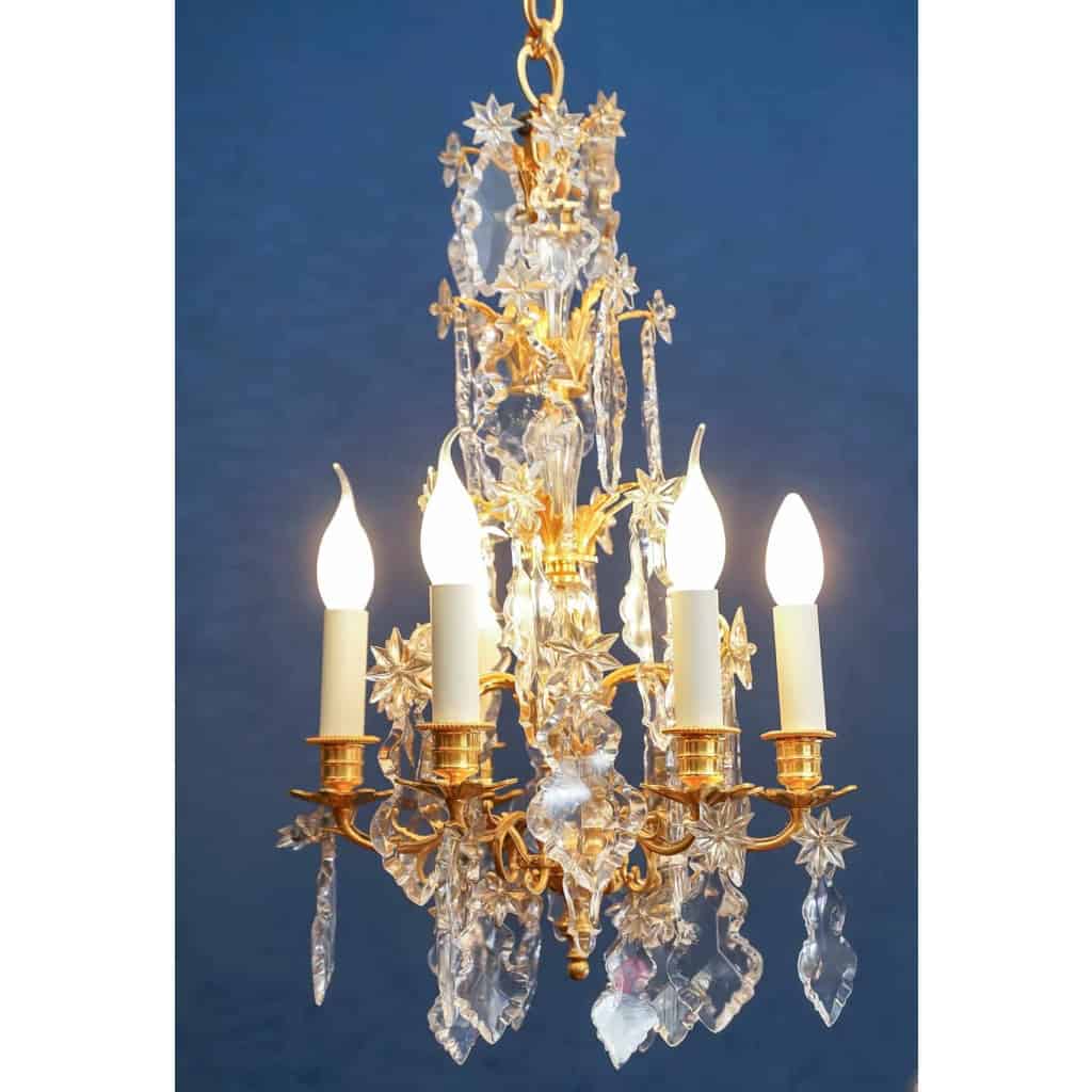 Paire de lustres de style Louis XV. | Biron Paire de lustres de style Louis XV.